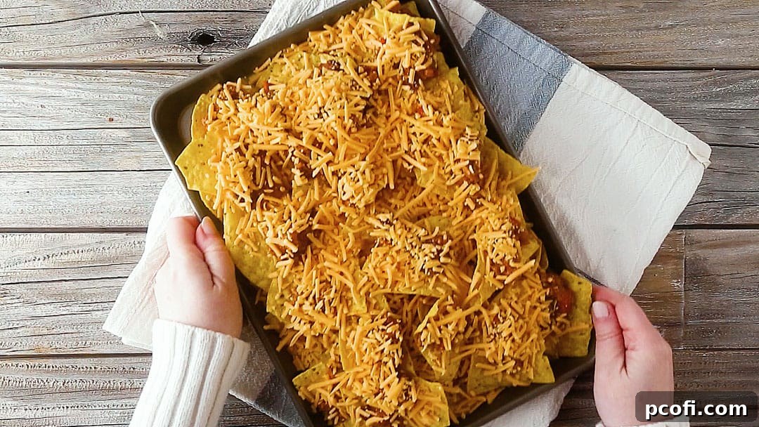 Sheet pan nachos recipe, ready to go into the oven.