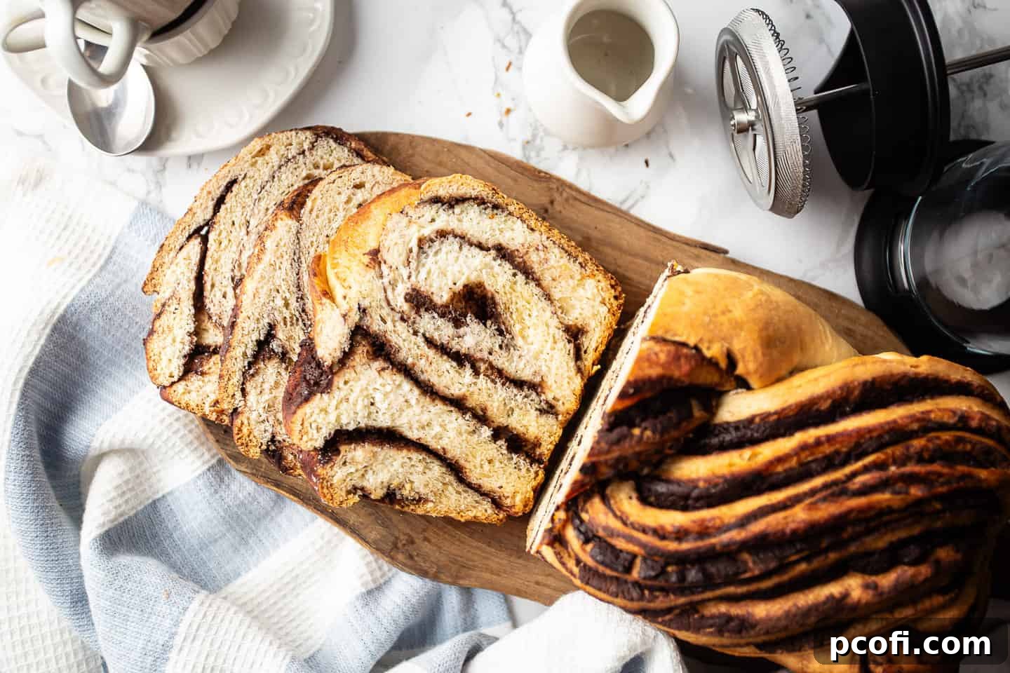 Chocolate babka bread sliced to display the swirl inside.