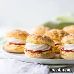 Irish scones on a white platter with a pale green napkin.