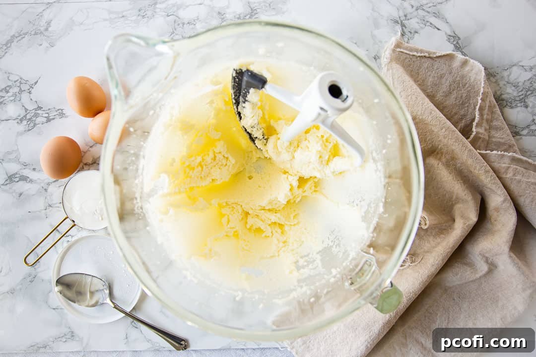 Creaming butter and sugar together to make chocolate pound cake.