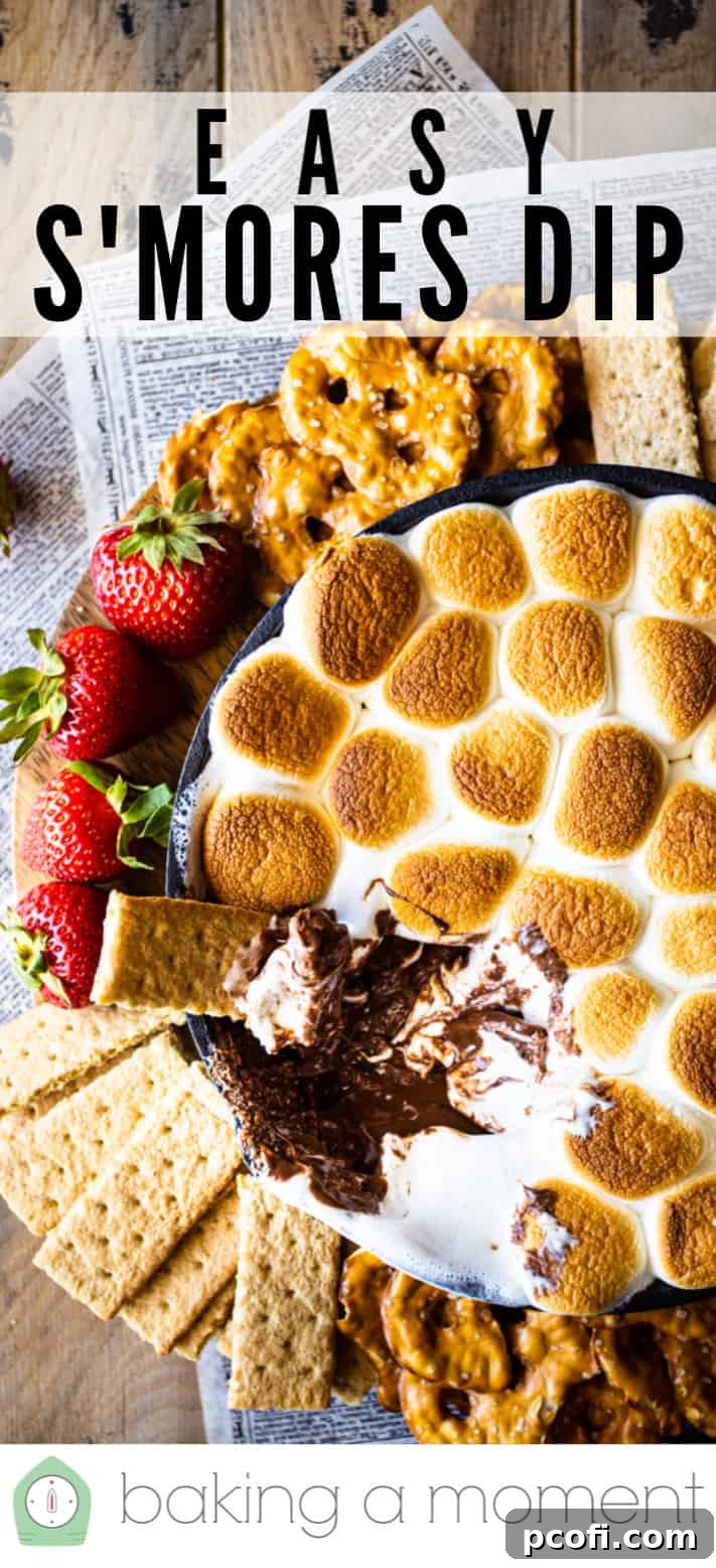 S'mores dip with mini marshmallows and fresh strawberries.