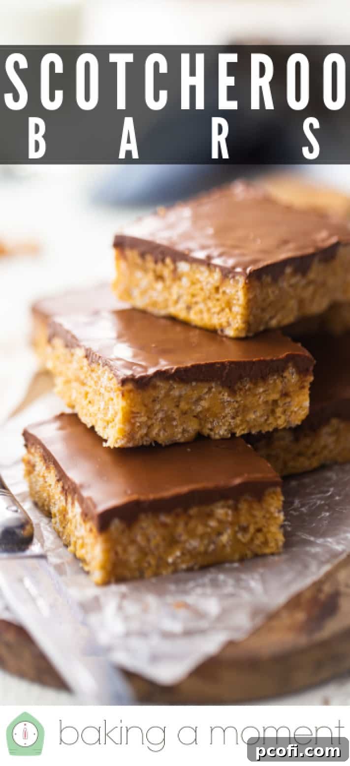 Rice krispie scotcheroos presented on a wooden board.