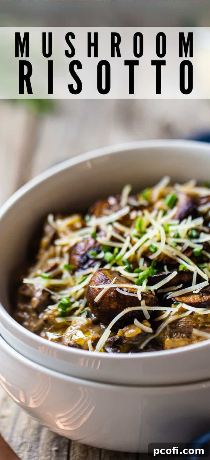 Mushroom risotto in a white bowl with grated parmesan.