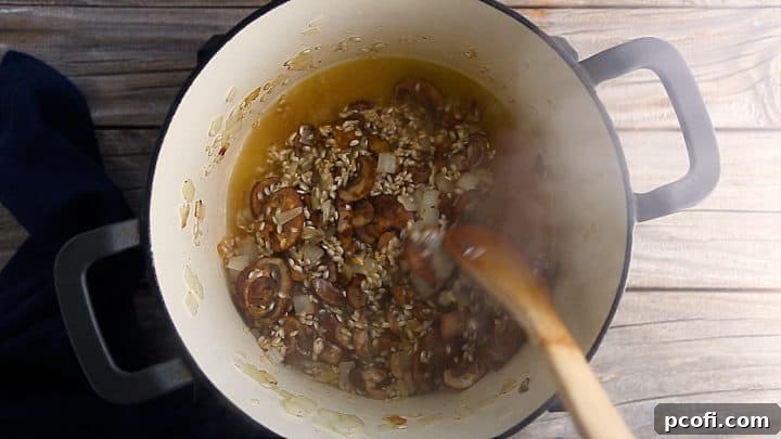 Deglazing mushroom risotto with white wine.