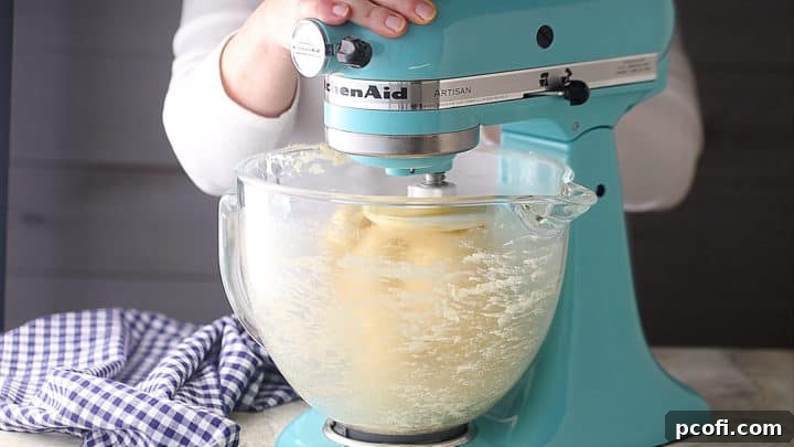 Kneading brioche dough in a stand mixer.