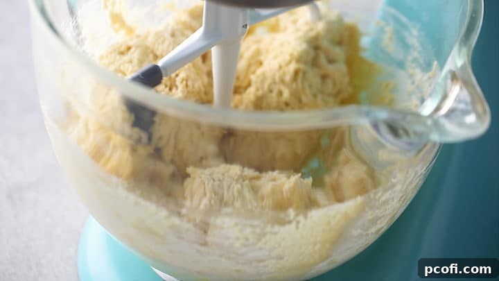 Mixing dough until just barely combined.