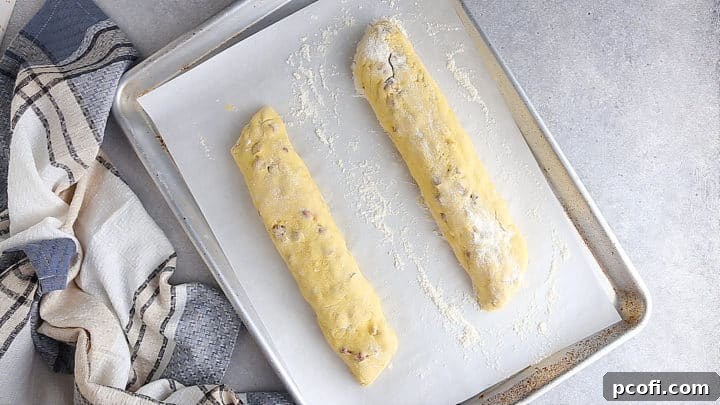 Dough formed into 2 long loaves.