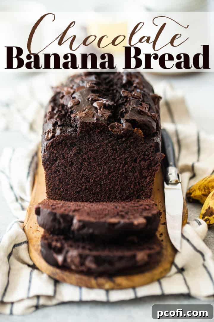 Chocolate banana bread recipe with chocolate chips, served on a striped cloth with a text overlay above that reads "Chocolate Banana Bread."