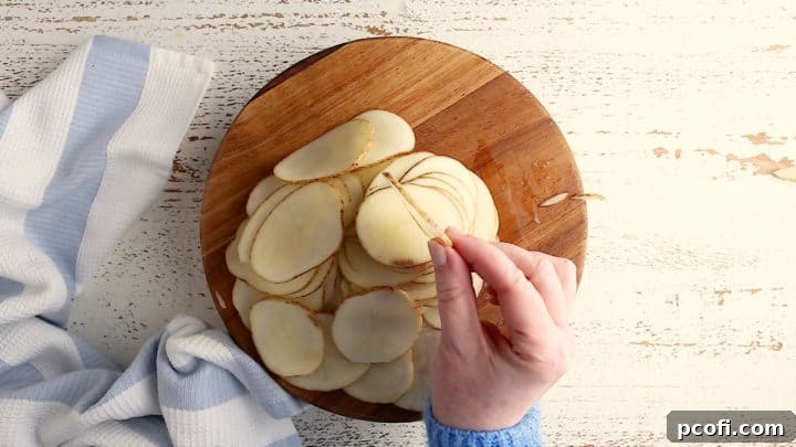Overhead image showing how thinly the potatoes should be sliced.