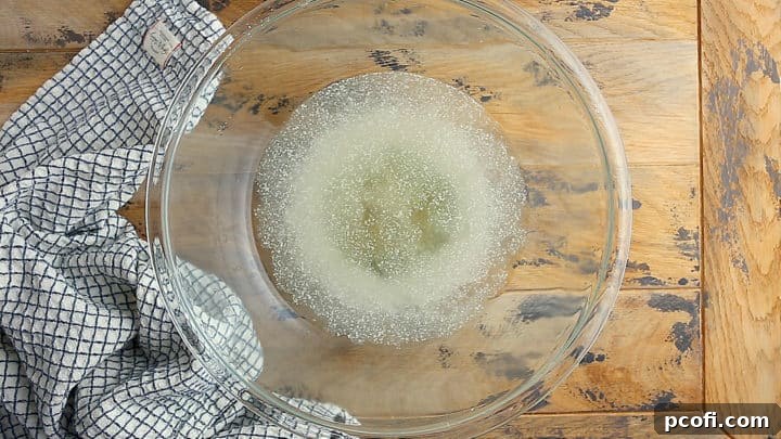 Bloomed yeast starting to foam.