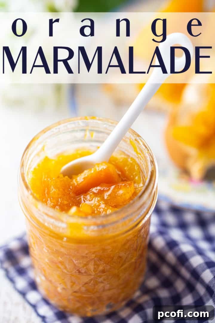 Orange marmalade in a glass jar on a checkered cloth, with a text overlay that reads "Orange Marmalade" and showcases its rich color.