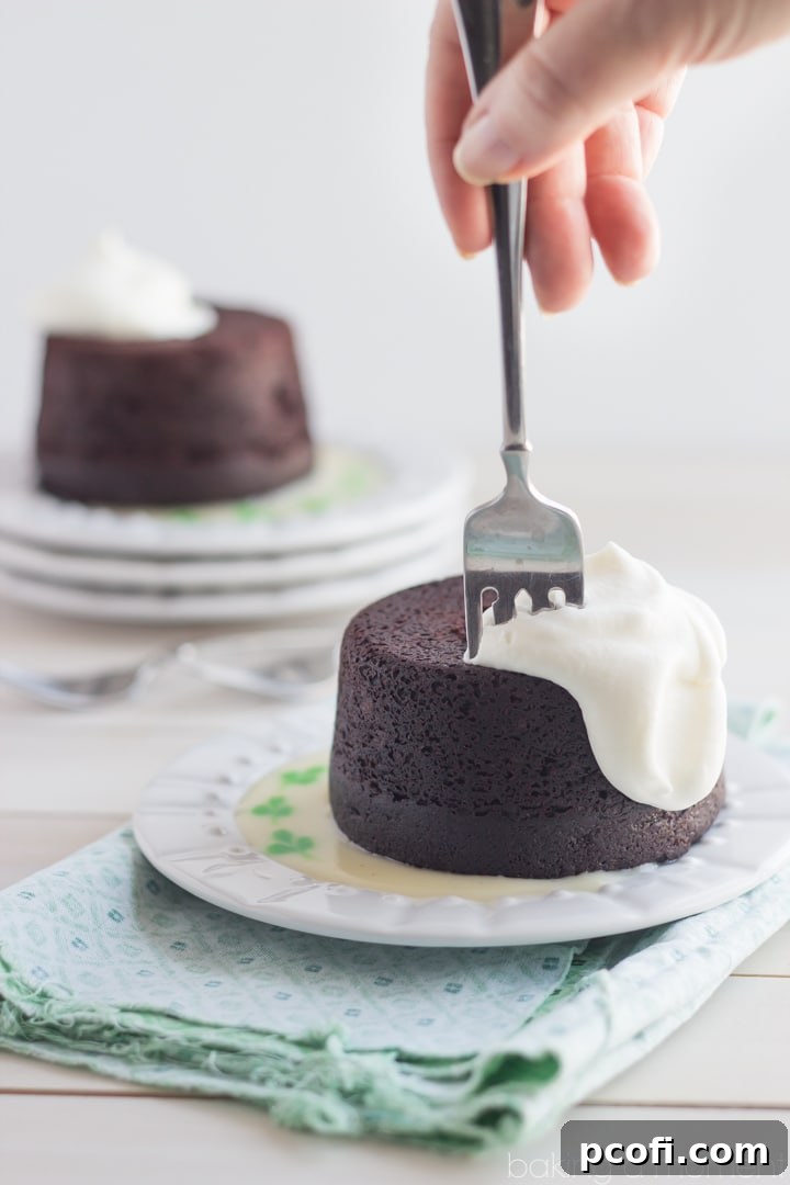 A mini bundt cake drizzled with Irish Whiskey Hard Sauce, ready to be served