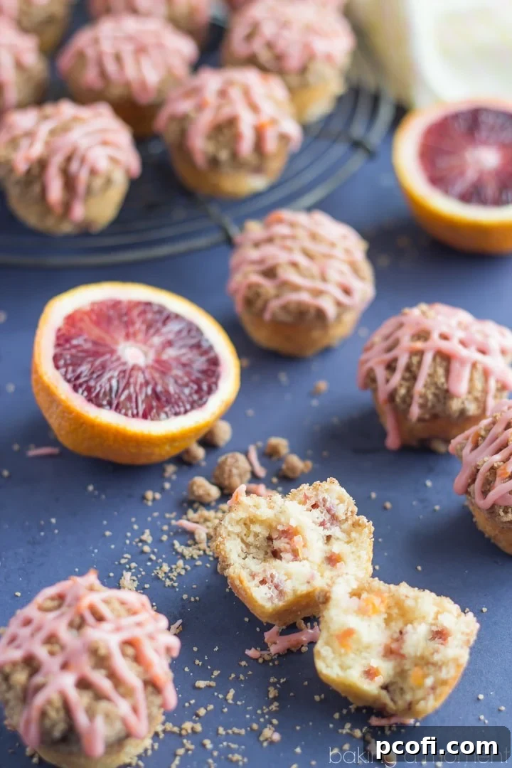 Freshly cut blood orange segments arranged, showcasing their vibrant color