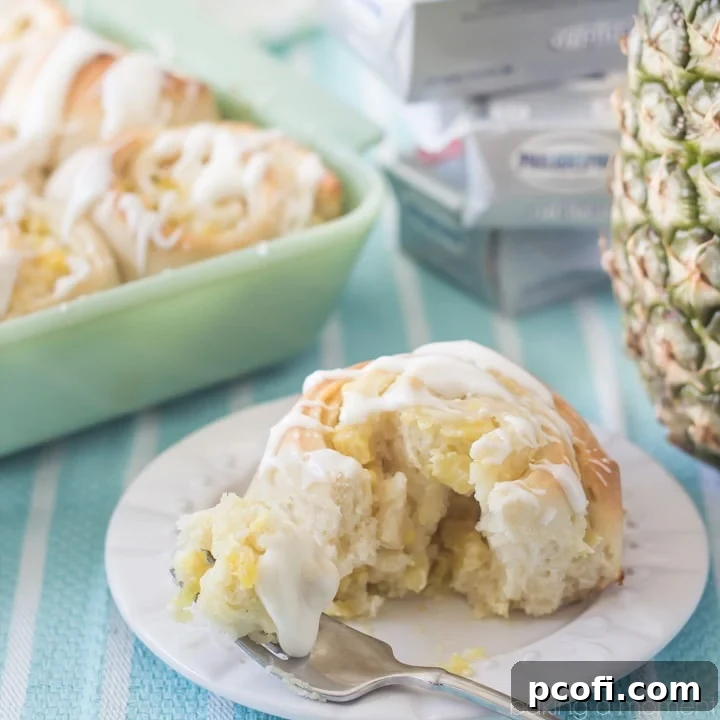 Soft and gooey Pineapple Cream Cheese Sweet Rolls with a generous cream cheese drizzle, ready for a delicious brunch. A perfect blend of tropical sweetness and creamy tang, ideal for Easter or any special gathering. #OnlyPhiladelphia #MyCreamCheese @LoveMyPhilly #sponsored