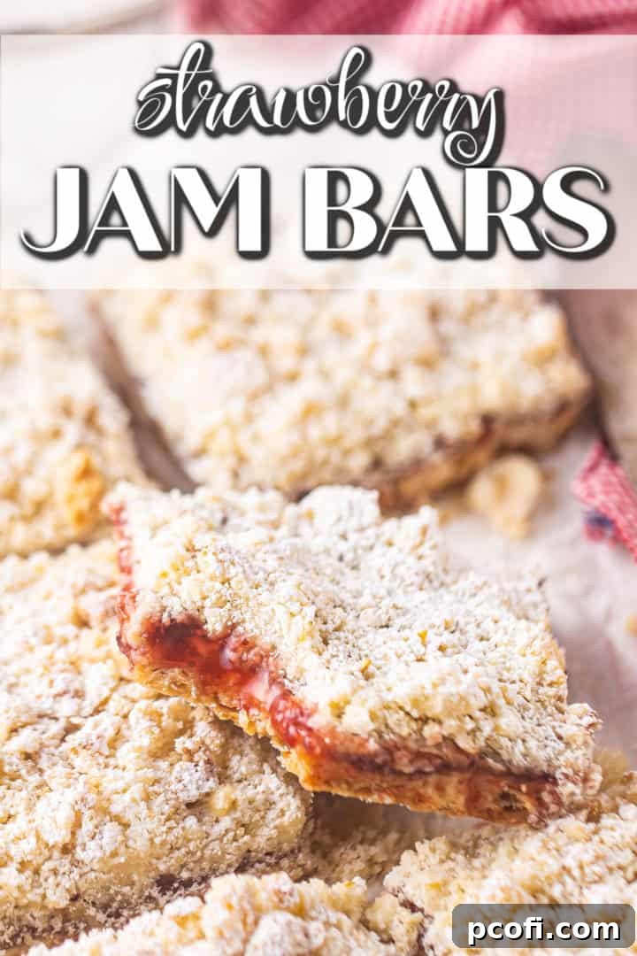 Perfectly cut strawberry jam bars, arranged in neat squares, ready to be enjoyed. Above, a text banner reads "Strawberry Jam Bars."