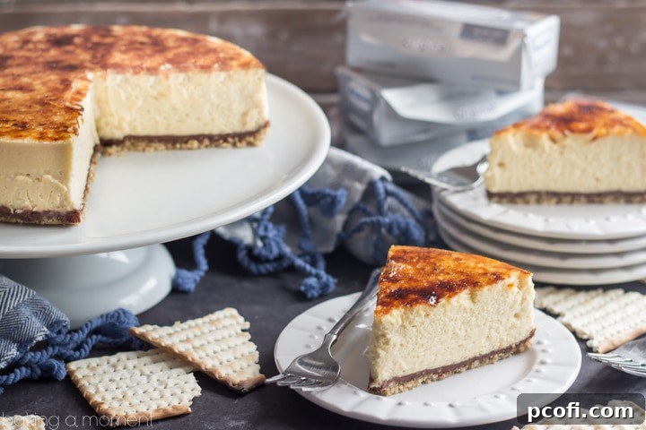 This stunning Toffee Crunch Cheesecake is a must-try for any holiday gathering, featuring a unique matzoh crust, creamy filling, and a beautiful brulee topping that will impress everyone.