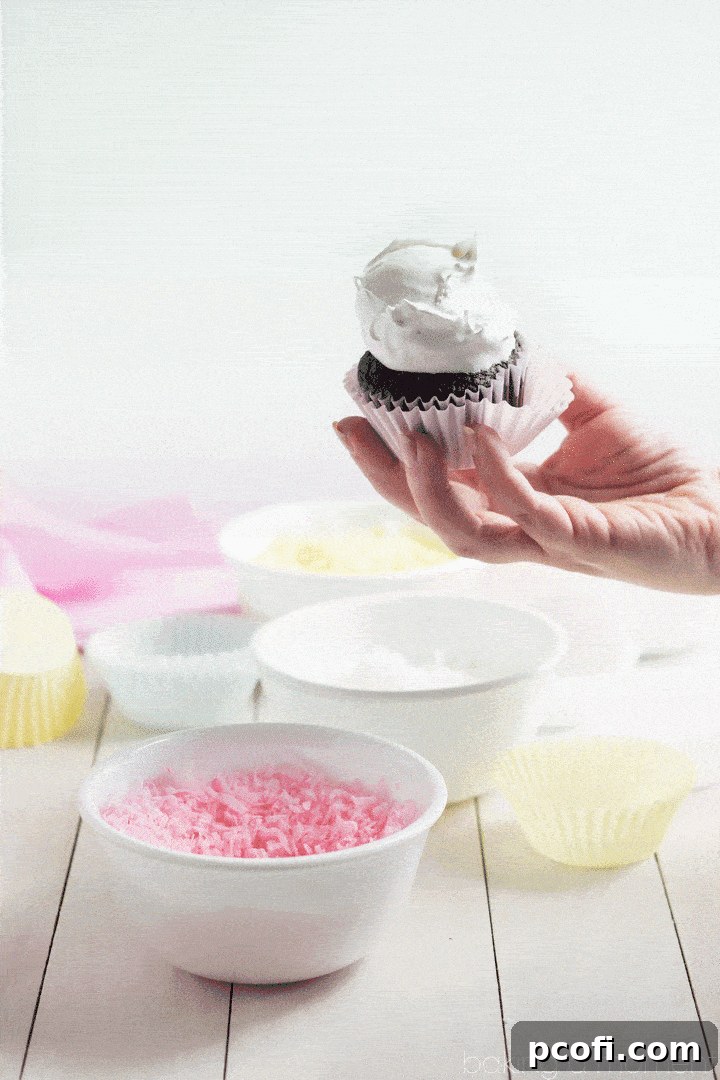 The simple joy of creating: different portions of sweetened flaked coconut, each tinted with a vibrant pastel food coloring, ready to transform ordinary cupcakes into extraordinary snowball treats.