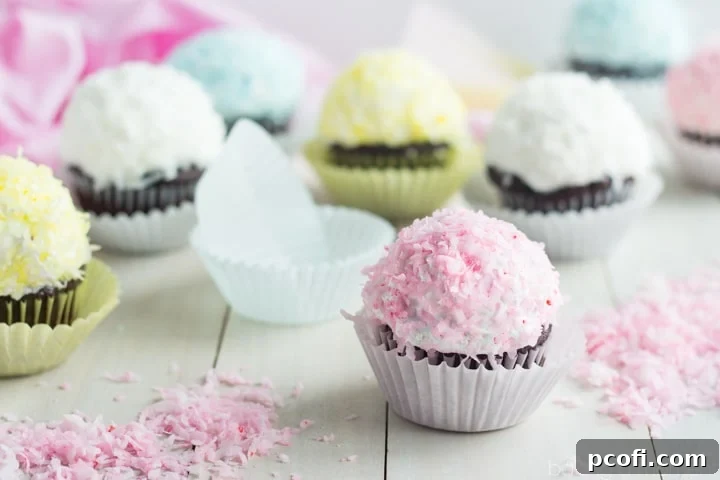 A joyful display of pastel snowball cupcakes, a perfect treat for Easter. Their vibrant colors and delicious flavors promise a delightful experience for any springtime celebration.