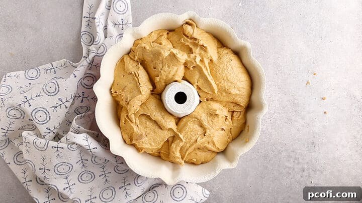 Unbaked pumpkin cake in a standard-sized bundt pan.