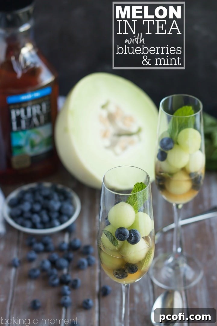 Simple as can be and so refreshing! These melon balls in tea with blueberries and mint will definitely be making an appearance at our next brunch! #puresummer #ad