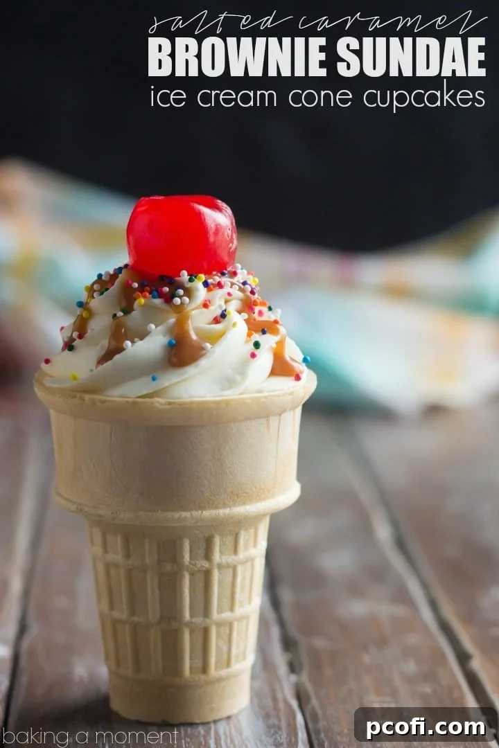 Close-up of brownie sundae ice cream cone cupcakes with fluffy whipped cream and sprinkles.