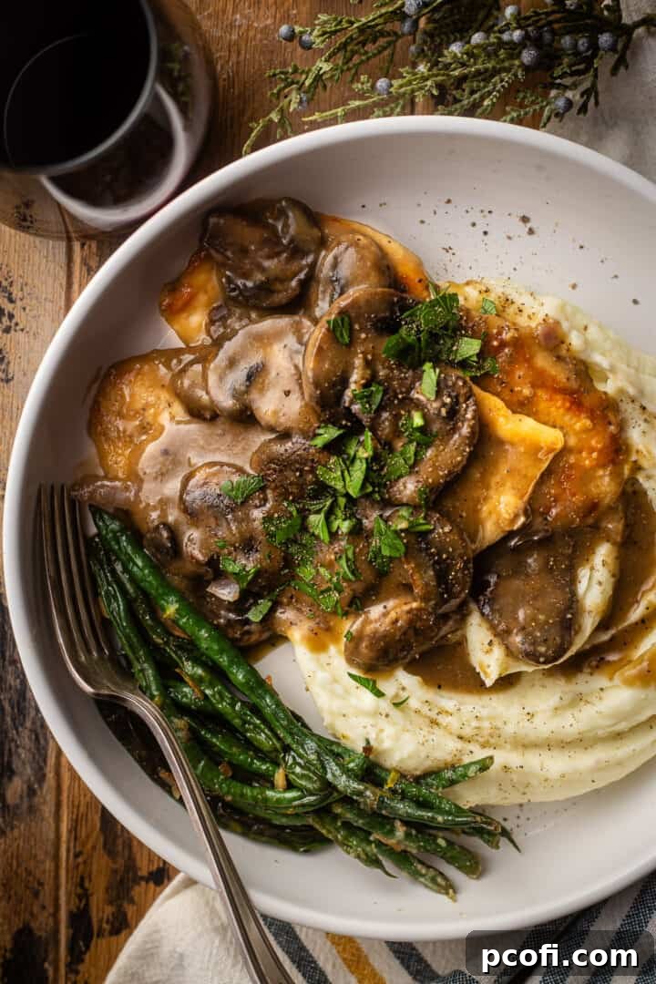 Marsala sauce served over chicken cutlets and mashed potatoes.