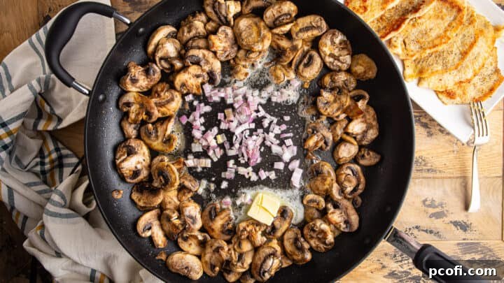 Sauteeing mushrooms and shallot in butter.