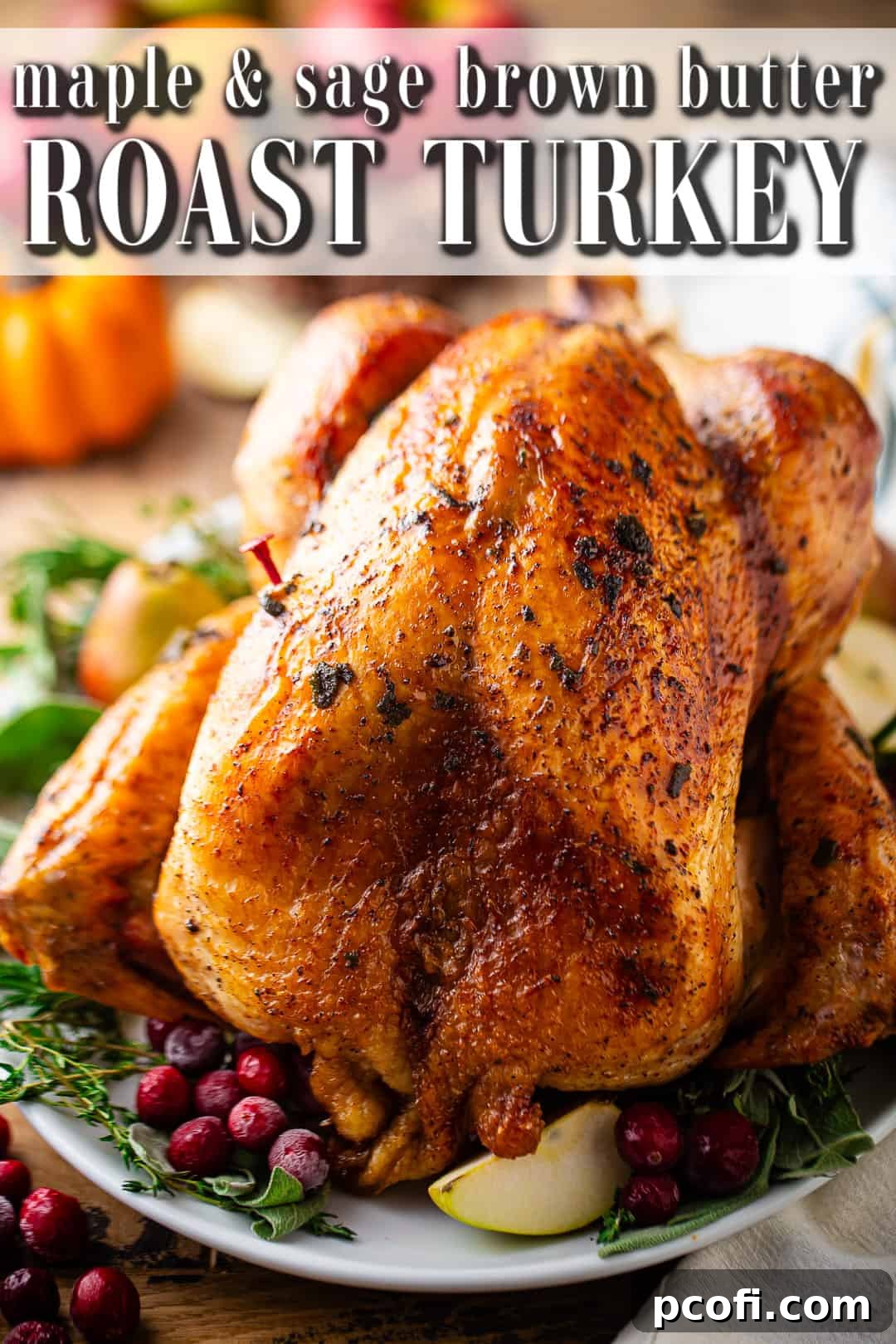 Best turkey recipe prepared and presented on a platter with herbs and seasonal fruits.