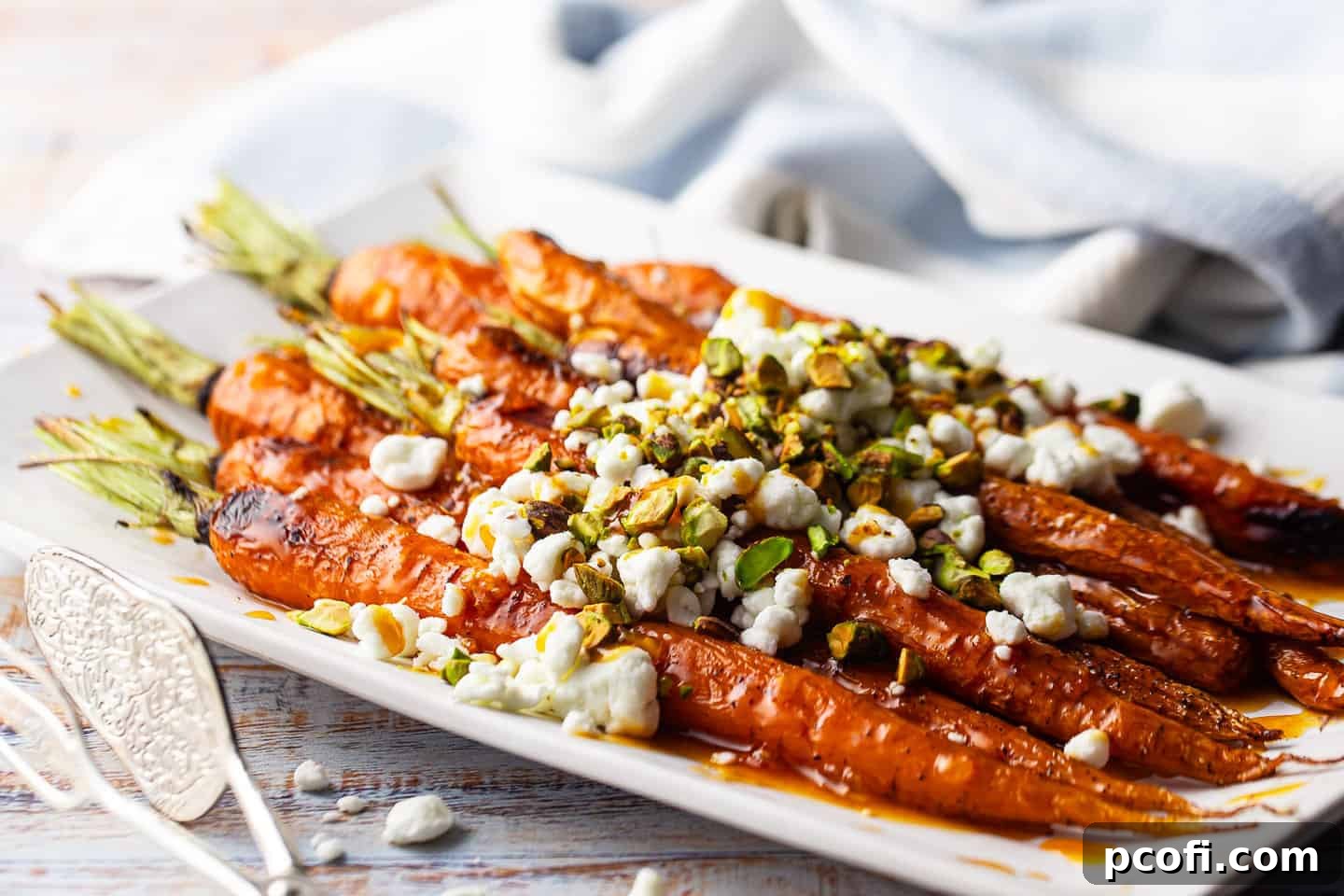 How to make glazed carrots with cheese and nuts, showcasing the finished dish.