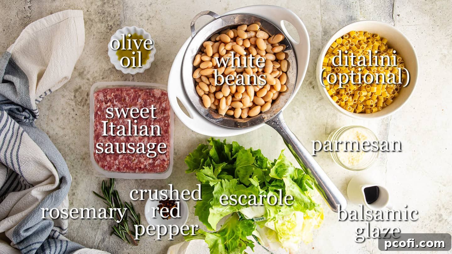 Ingredients for making white beans and greens, including olive oil, Italian sausage, rosemary, red pepper flakes, canned white beans, escarole, ditalini pasta, balsamic glaze, and Parmesan cheese.