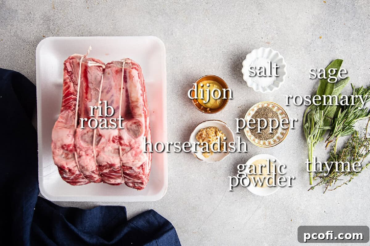 A selection of standing rib roast ingredients, including fresh herbs, garlic powder, salt, olive oil, and mustard, neatly arranged on a pristine white background.