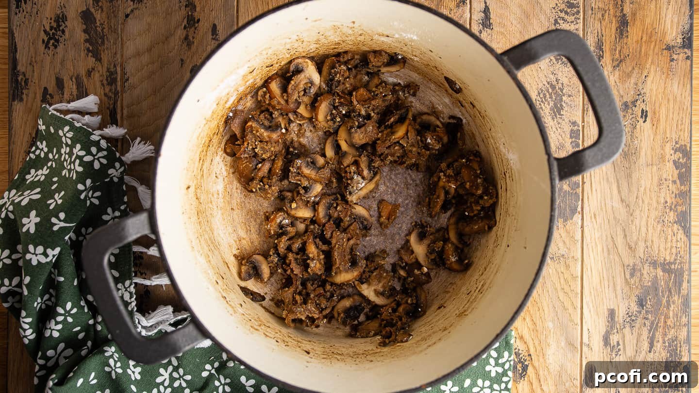 Making a mushroom roux for green bean casserole.