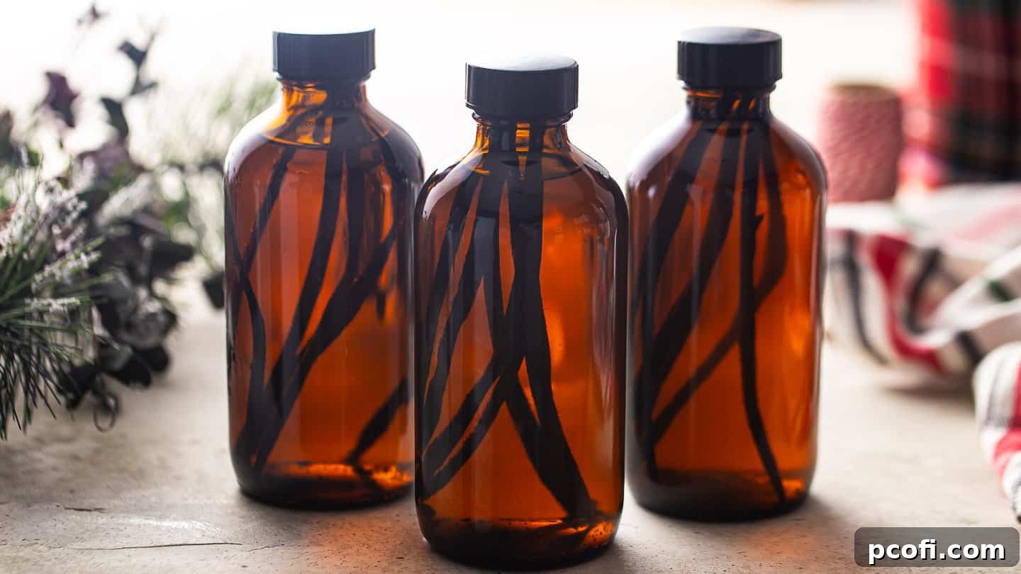 Various bottles of homemade vanilla extract infusing over several weeks, showcasing the gradual deepening of color as the vanilla flavor develops.