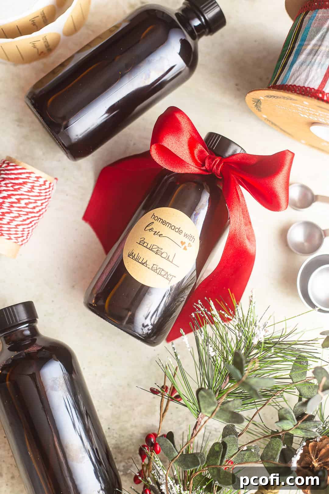 An illustrative graphic detailing how to make vanilla extract, showcasing ingredients and finished bottles, along with suggested uses and links to supplies.