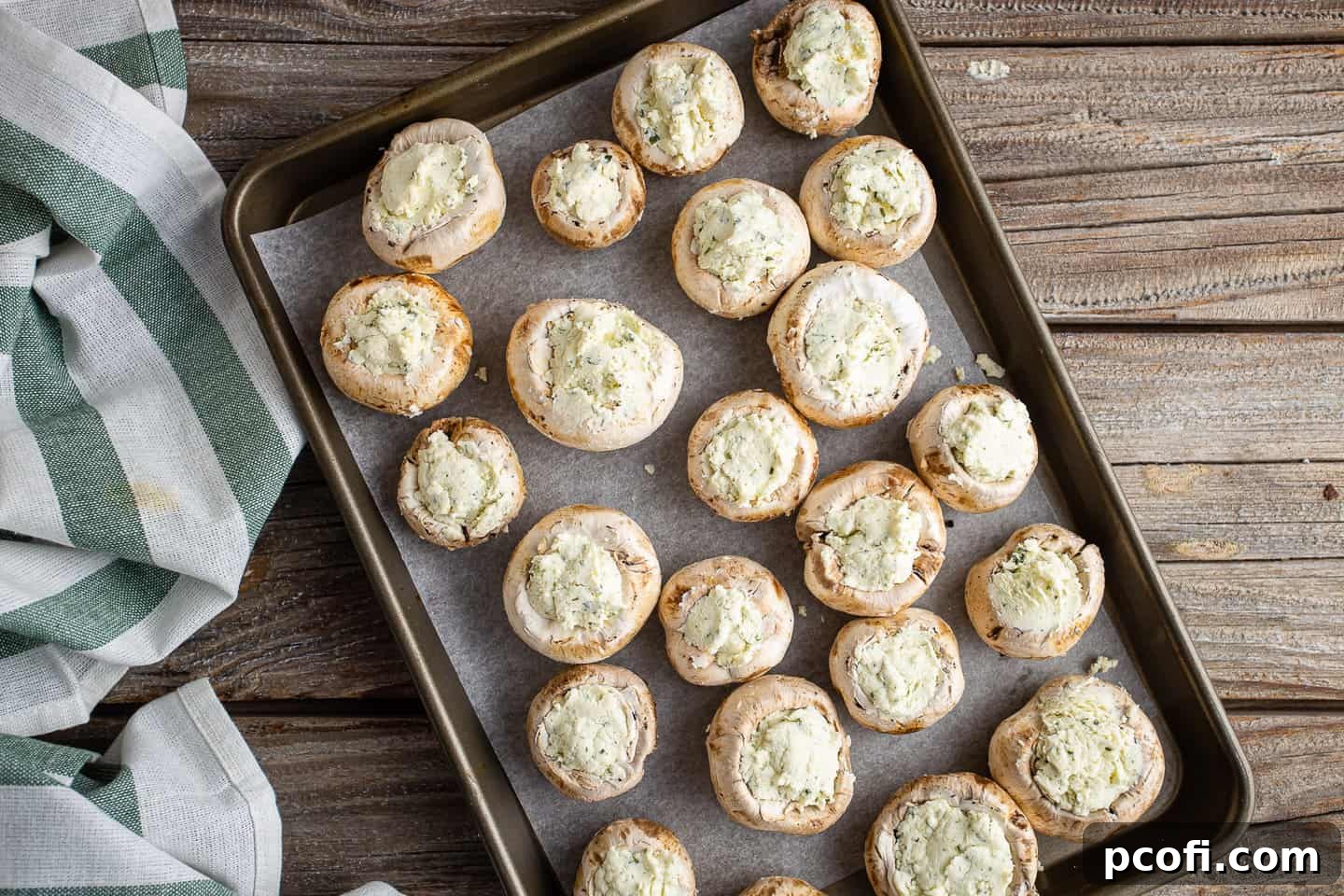 Stuffed mushrooms on a tray.