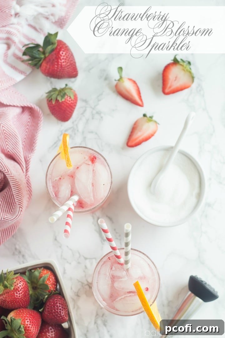 Close-up of the ingredients: fresh strawberries, orange blossom water, and sugar, ready for muddling.