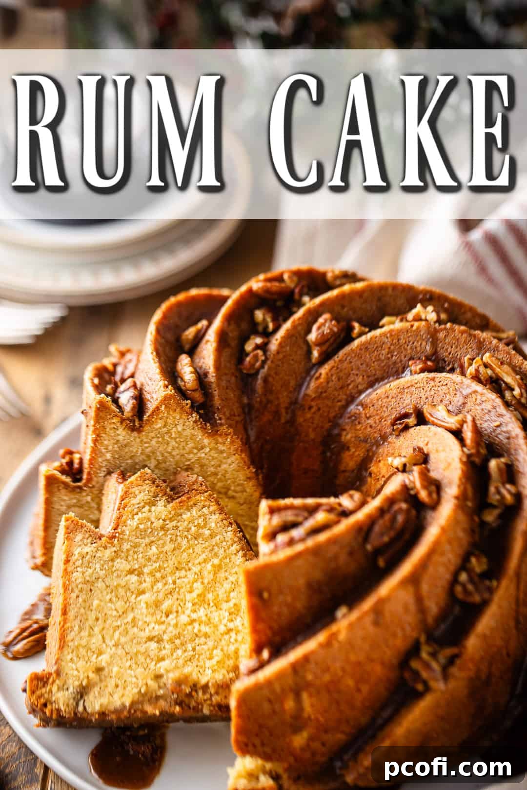 Rum cake recipe, baked in a spiral bundt pan and drizzled with buttery rum pecan glaze, a truly decadent treat.