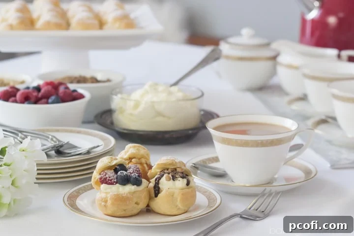 A beautifully set table for a Mother's Day tea party with exquisite pastries