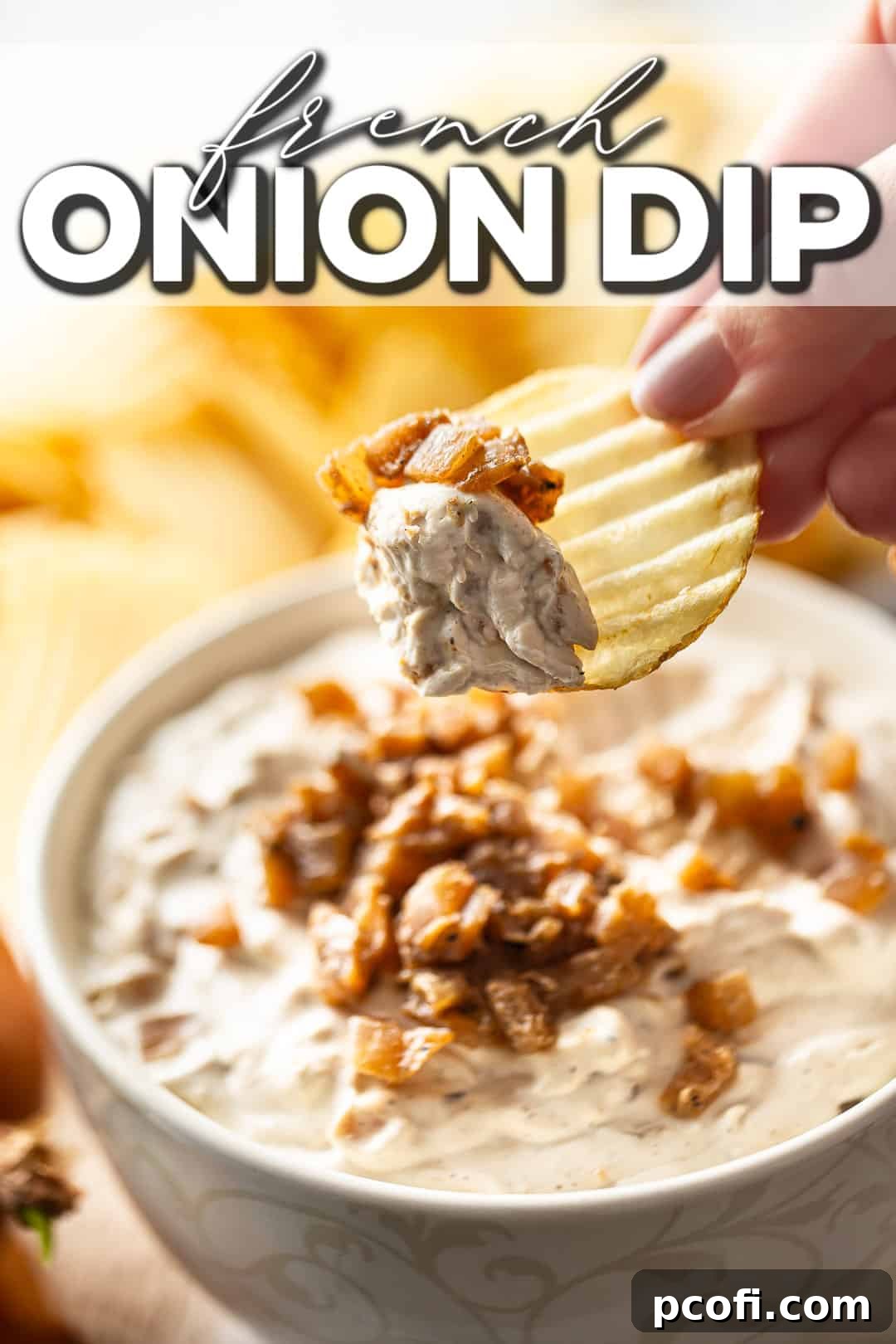 French onion dip recipe, prepared and served with wavy potato chips.