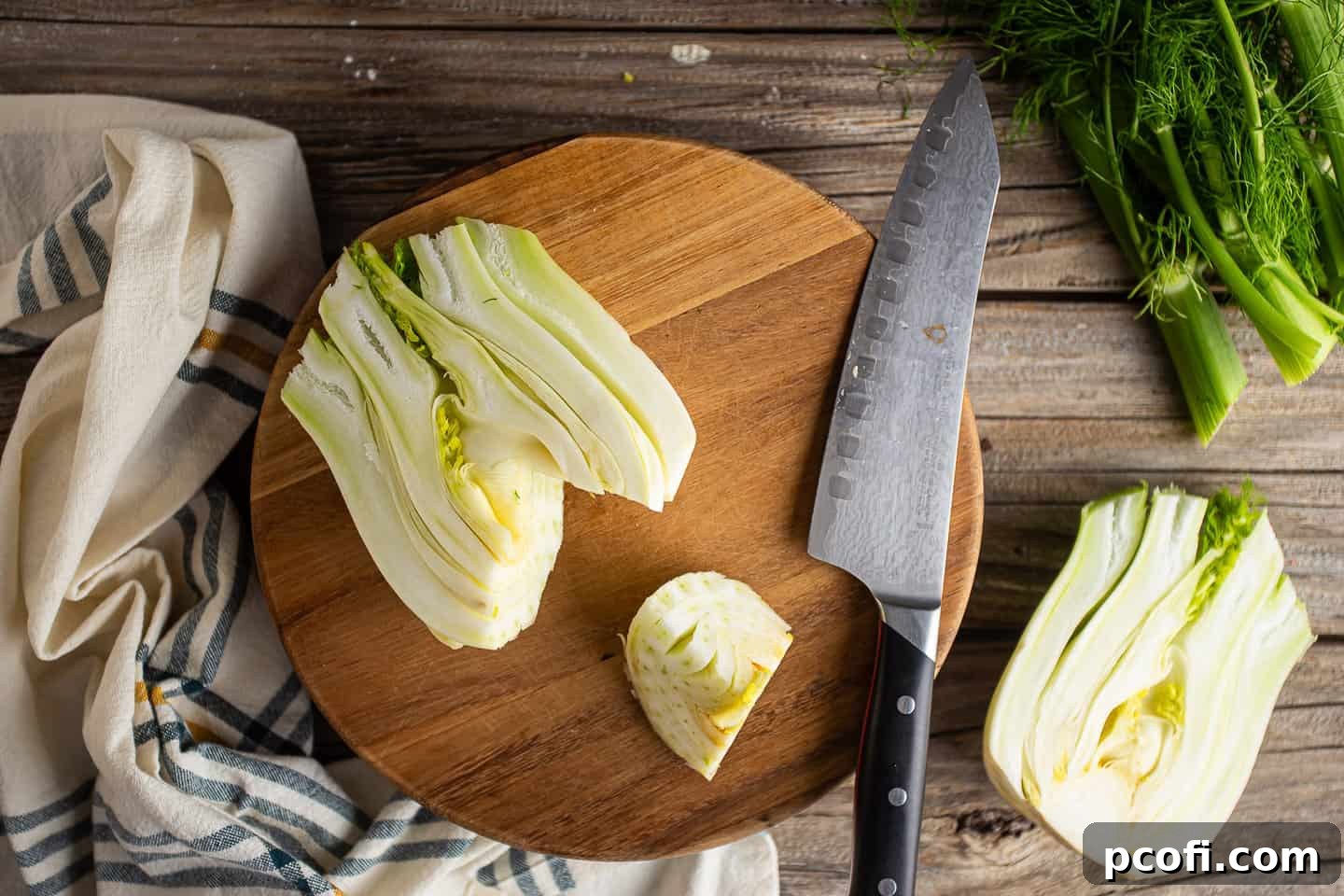 Illustrative image of removing the core from a fennel bulb.
