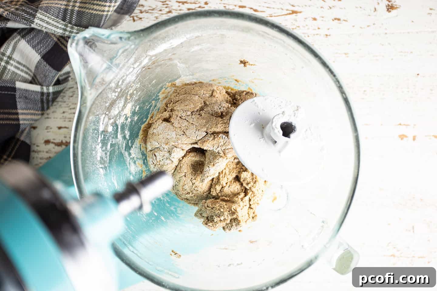 Working bread flour into rye bread dough.
