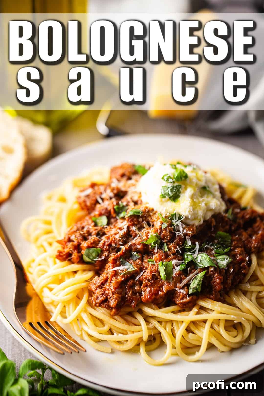 Delicious Bolognese recipe, beautifully prepared and served over pasta, garnished with fresh basil leaves.