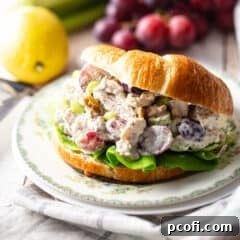 Chicken salad recipe, prepared and served on a split croissant.