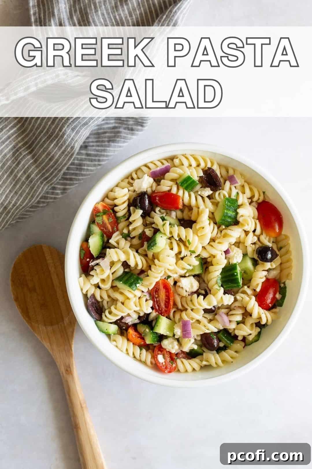 A beautifully arranged bowl of Greek pasta salad with a serving spoon, ready to be enjoyed. Text overlay highlights its ease and deliciousness.