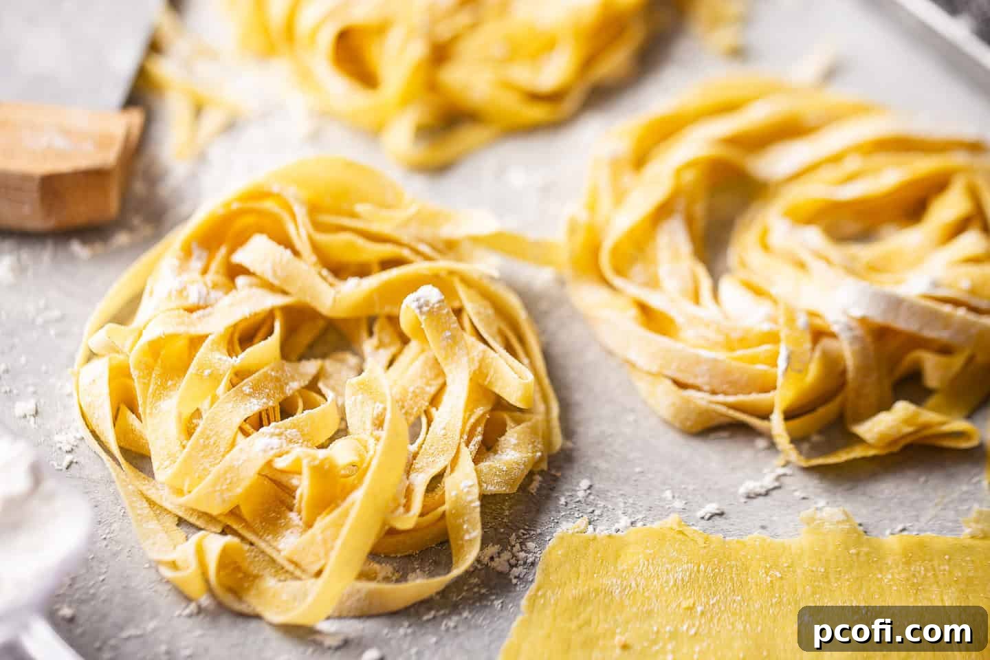 Homemade pasta recipes featuring freshly made tagliatelle, tossed with sauce.
