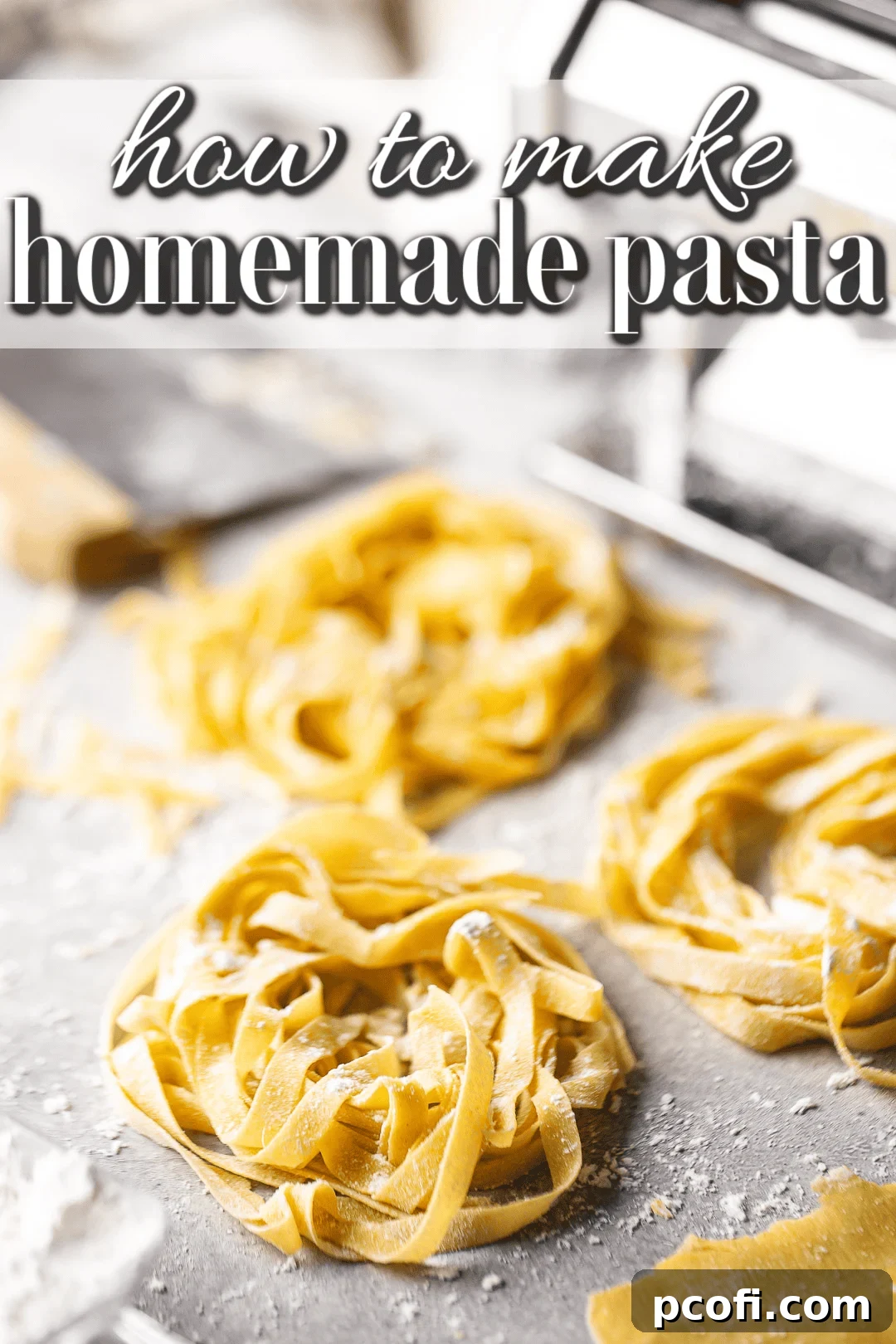 Homemade pasta dusted with flour and presented beautifully on a pale gray surface, showcasing its freshness.