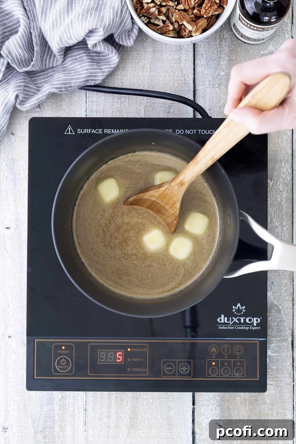 Melting ingredients in a saucepan for pralines