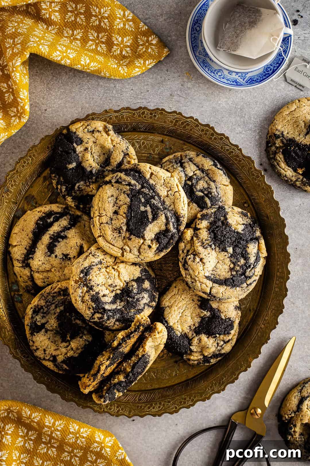 Earl Grey Black Sesame cookies artfully arranged on a platter, showcasing their unique marbled swirls.