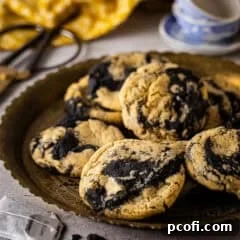 Earl Grey cookies on a platter with black streaks of sesame, perfect for a unique dessert.