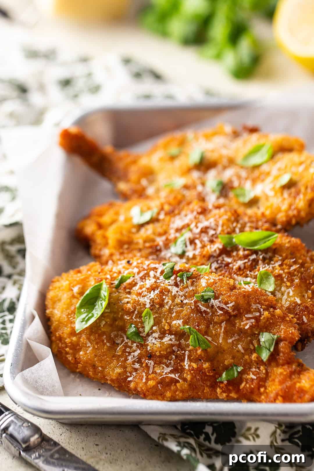 Chicken cutlets breaded and fried golden brown.